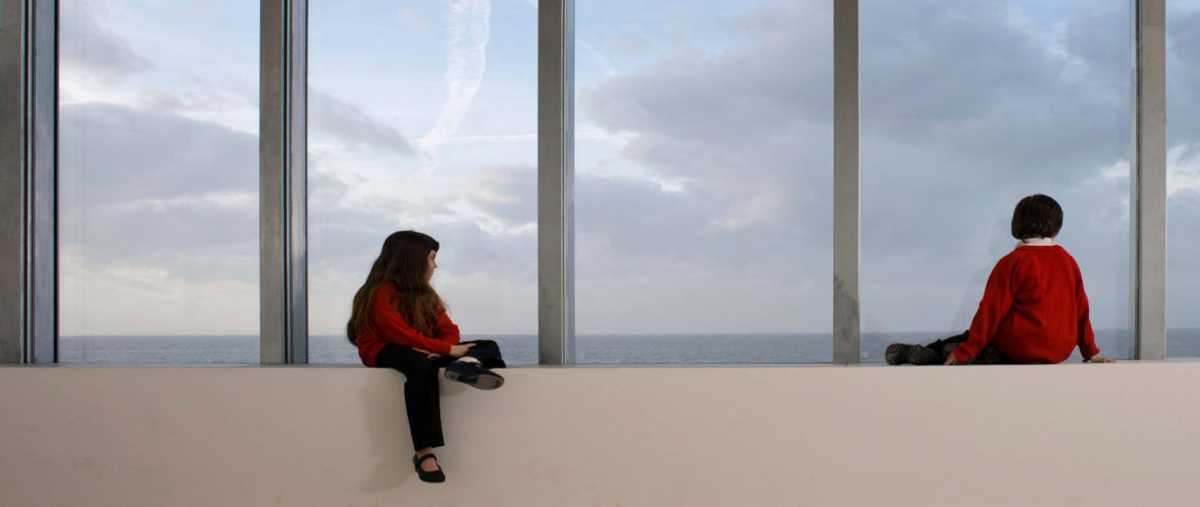 School children admire the view from the Clore Studio at Turner Contemporary, Margate. Photo Ady Kerry