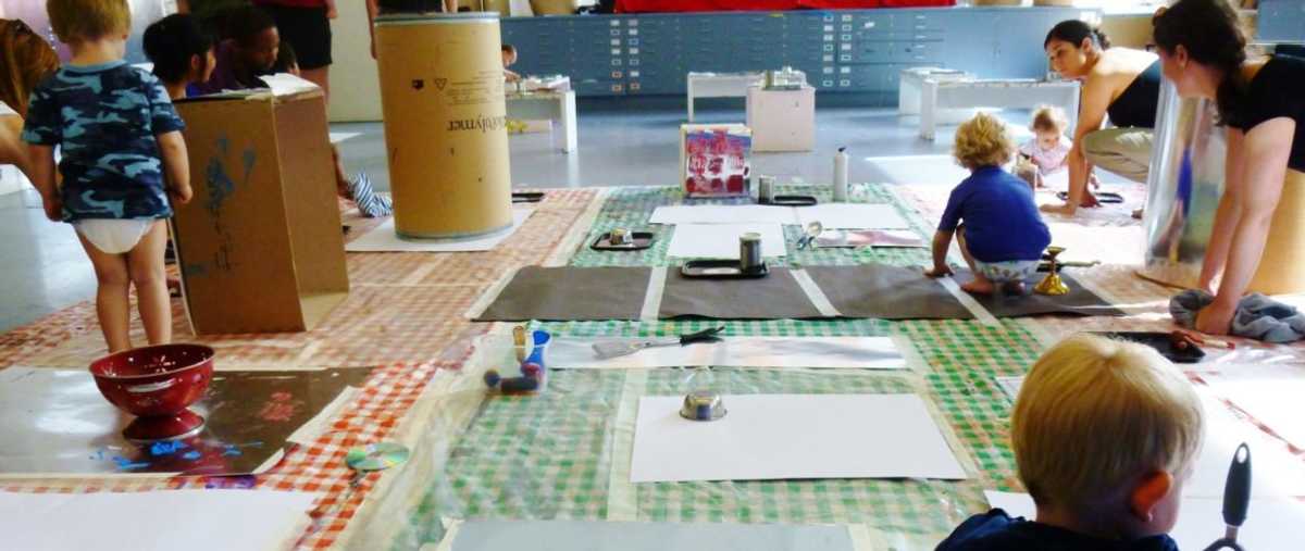 The floor in the learning space at Manchester City Art Gallery being used as a work space by families © Manchester Art Gallery, Manchester Metropolitan University